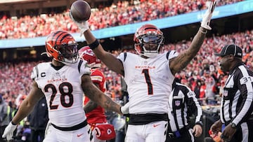 Jan 30, 2022; Kansas City, Missouri, USA; Cincinnati Bengals wide receiver Ja'Marr Chase (1) reacts after making a catch for a touchdown against the Kansas City Chiefs during the third quarter of the AFC Championship Game at GEHA Field at Arrowhead S